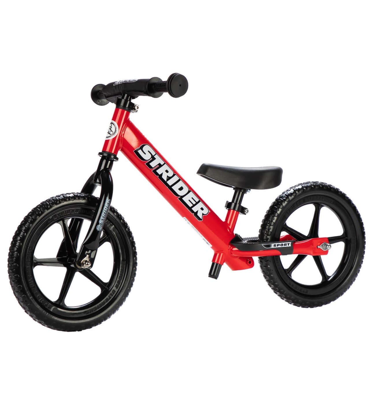 Strider 12 Sport Balance Bike in red for toddlers, featuring no-flat tires and mini grips for easy riding.