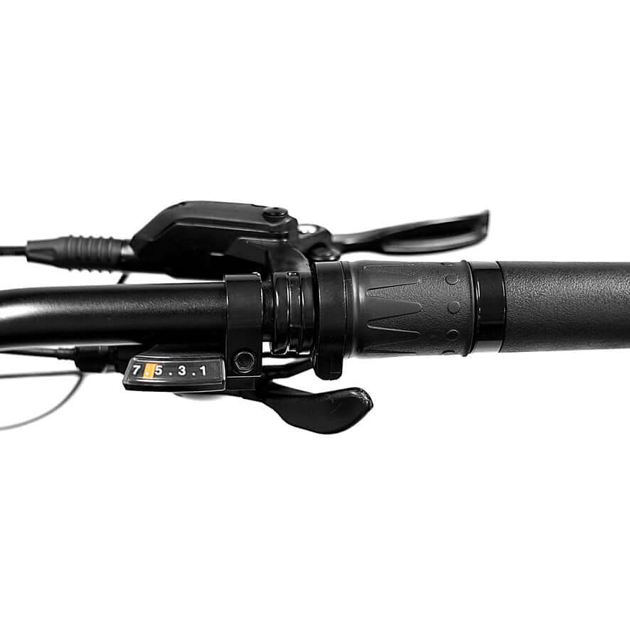 Close-up of the Golden Cycles Panthro electric bike's handlebar with Shimano 7-speed gear shifter.
