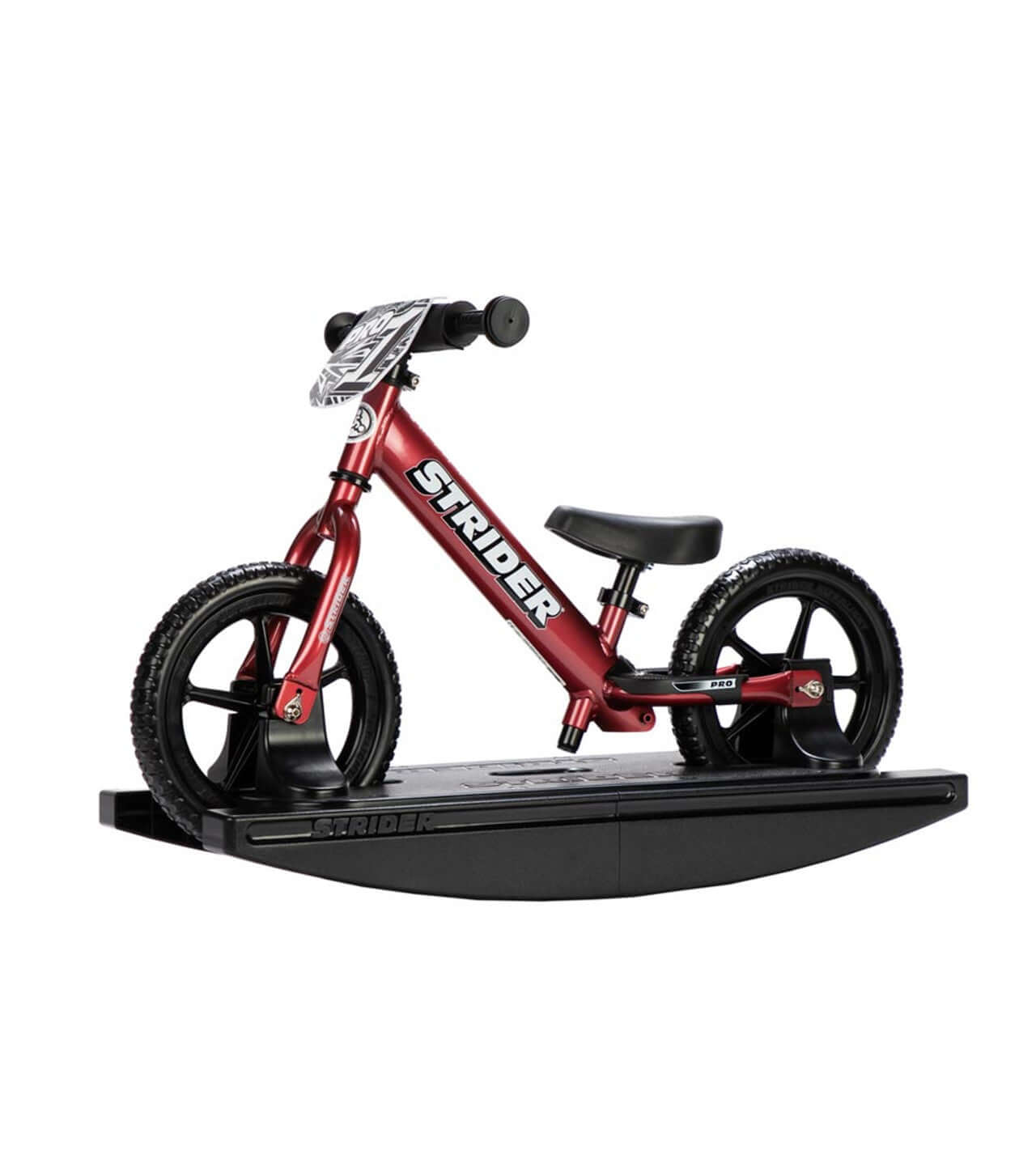 Strider Pro 2-in-1 Rocking Bike on detachable base, perfect for infants to bond and play before walking.