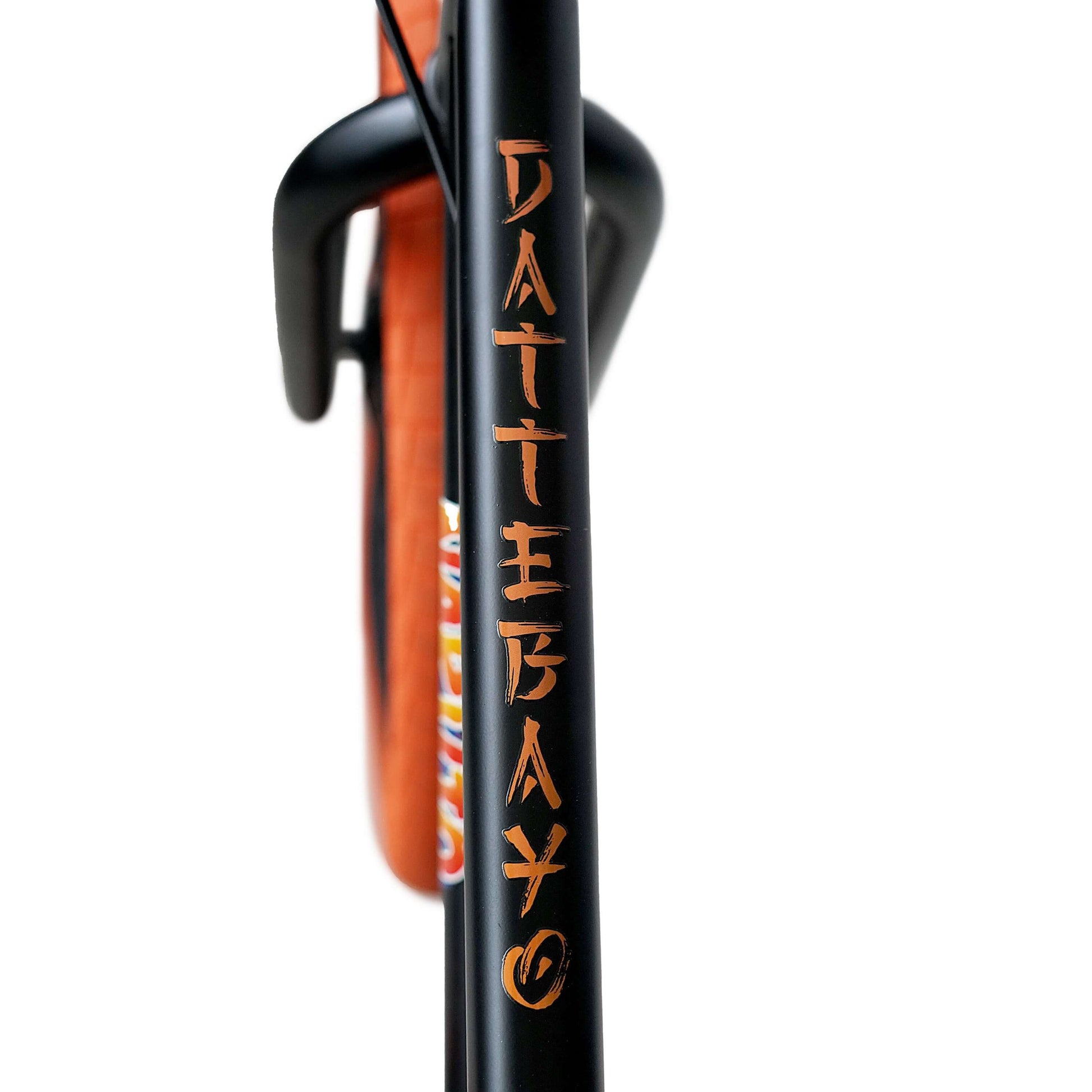 Close-up of the 'Dattebayo' graphic on the Elite BMX Naruto bike frame, showcasing iconic design features.