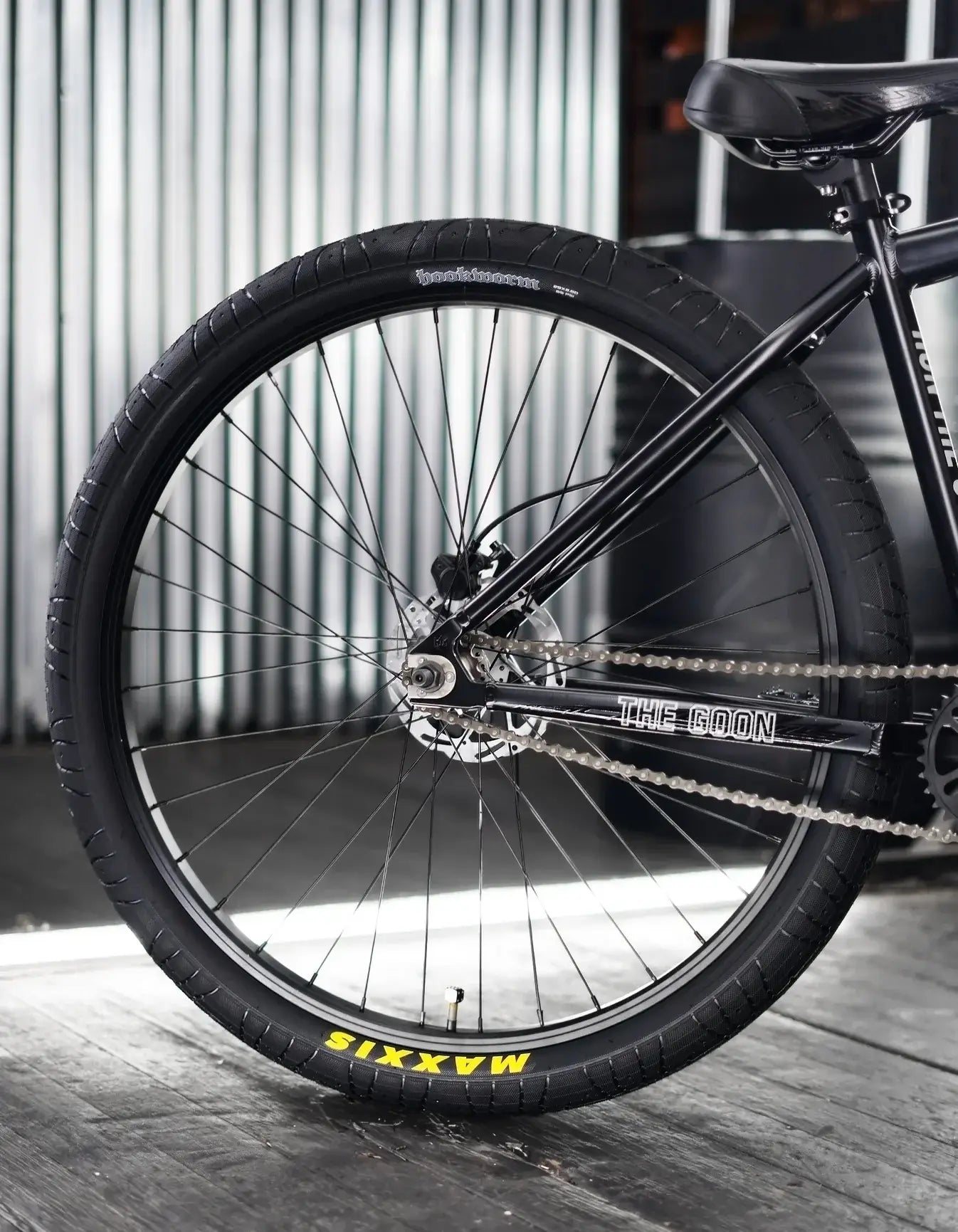 Close-up of The Goon 29" BMX bike wheel showcasing durable tire and strong brake components.