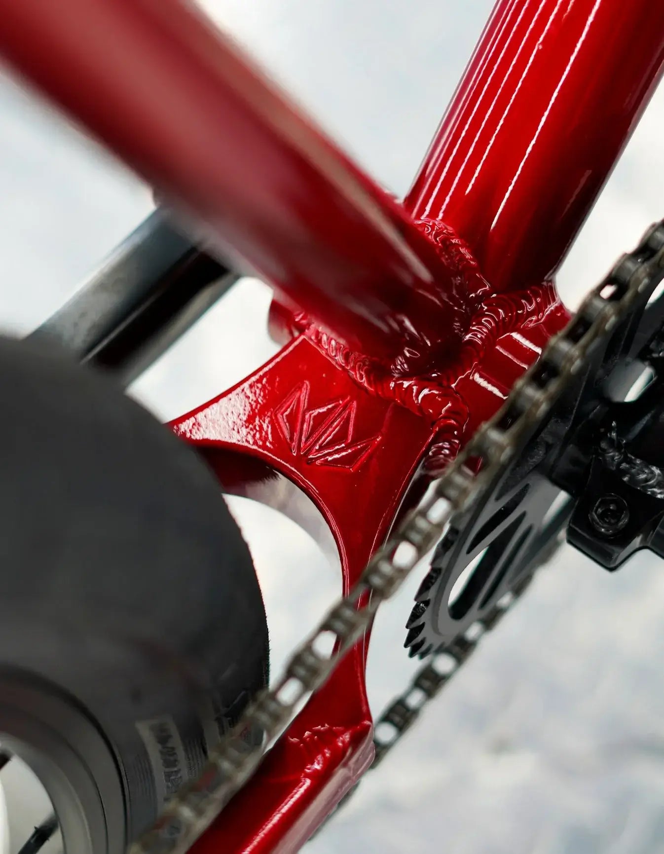 Close-up of the red welded big yolk on the Throne Goon 29" BMX bike for enhanced durability and performance.