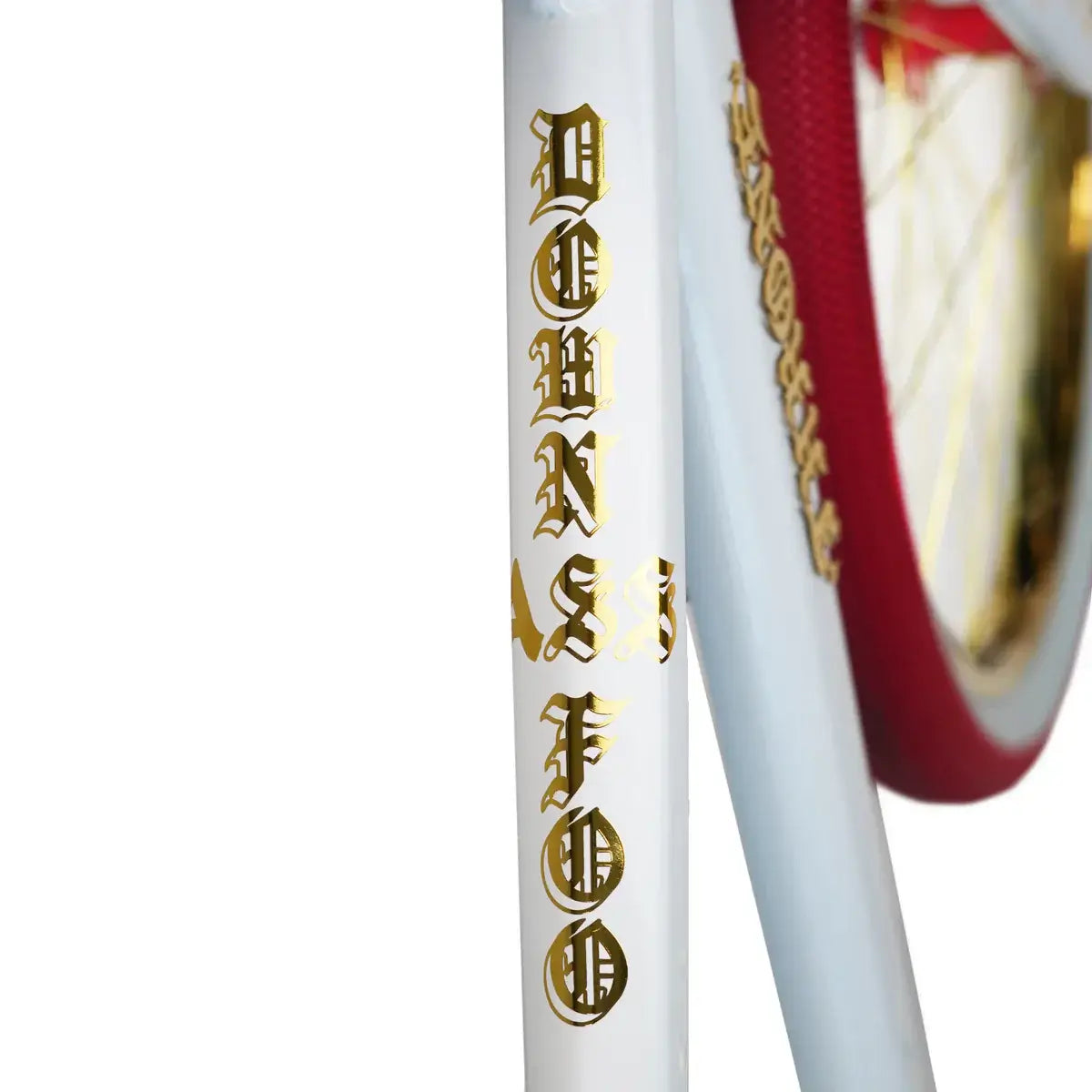 Close-up of the Throne BMX bike frame featuring striking gold lettering and a sleek white design.