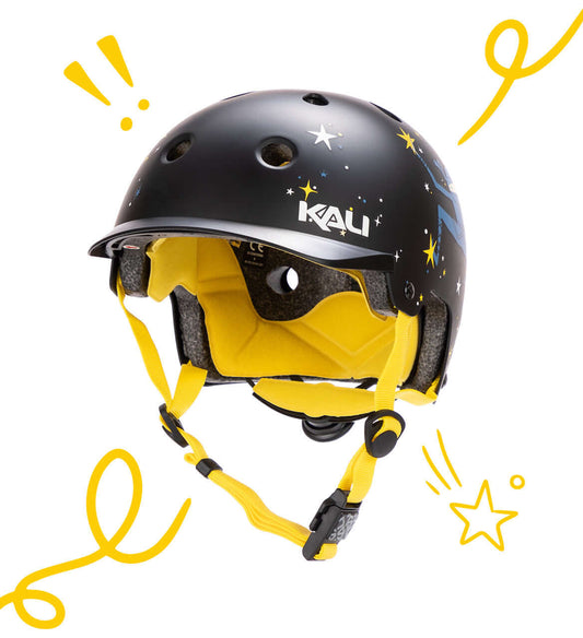Kali child helmet with star design and yellow straps, perfect for bike rides and outdoor activities.
