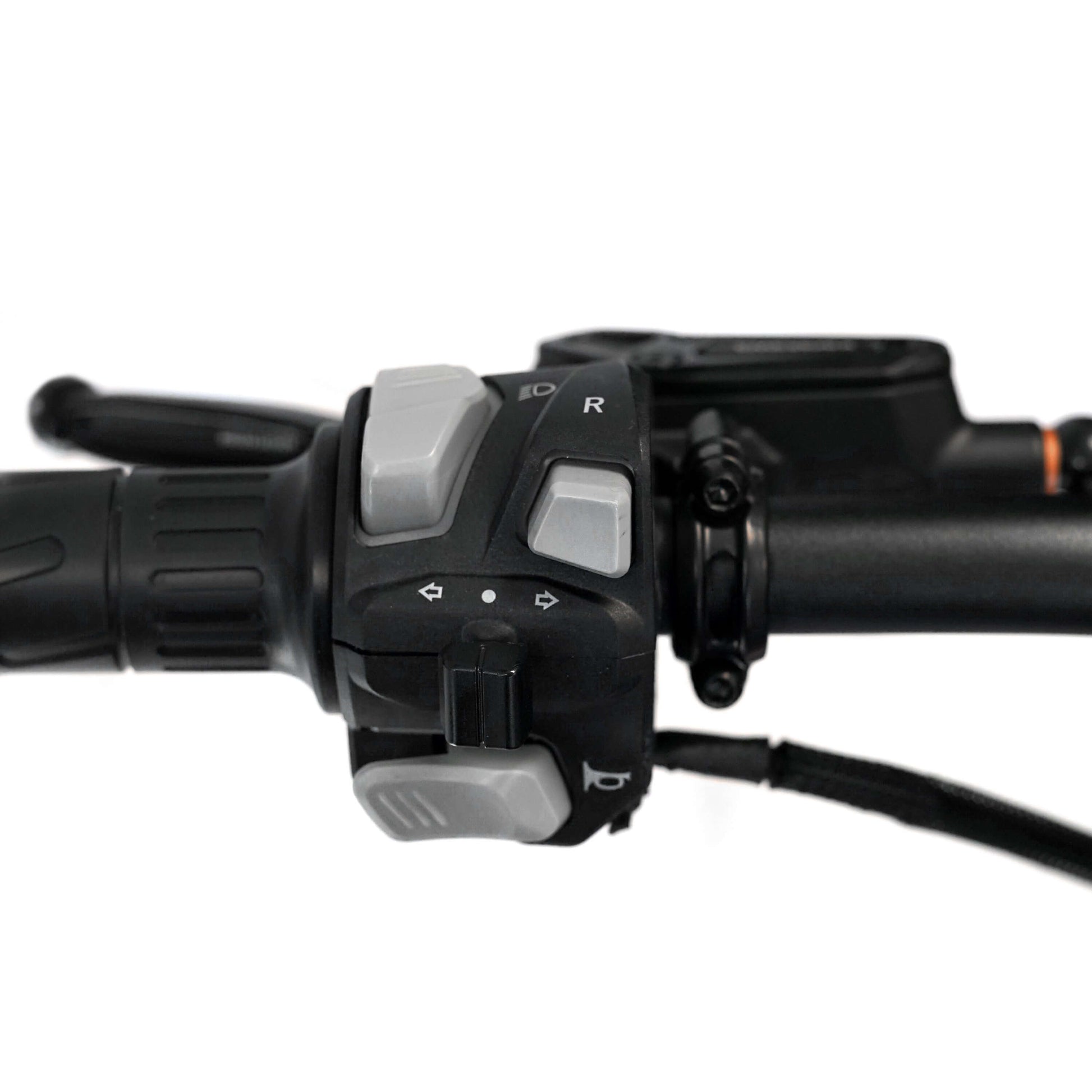 Close-up of Throne SRPNT e-DIRT BIKE handlebar controls showcasing throttle and gear switch.