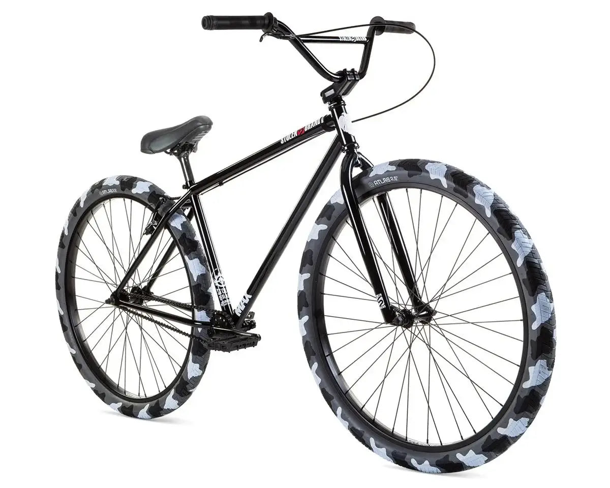Stolen Max 29" Bike with black frame and camouflage patterned tires for smooth cruising and commuting.