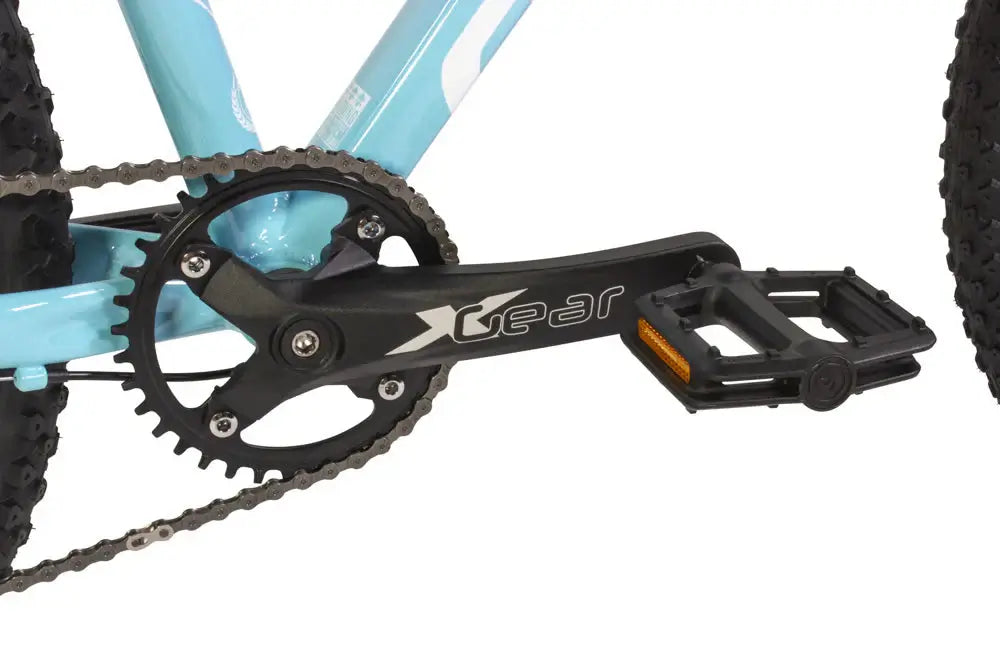 Close-up of Eastern Bike Alpaka's black pedal and crankset with blue frame, showcasing the gear system and design features.