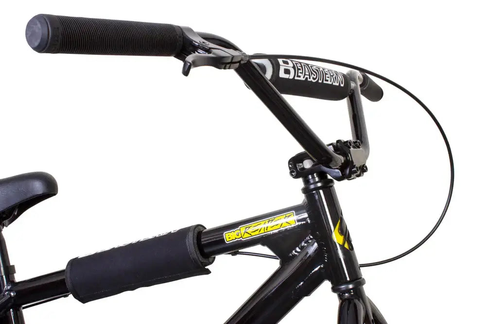 Close-up of Eastern Bike Big Reaper LTD handlebars with Riblet grips and brake cables for street performance.