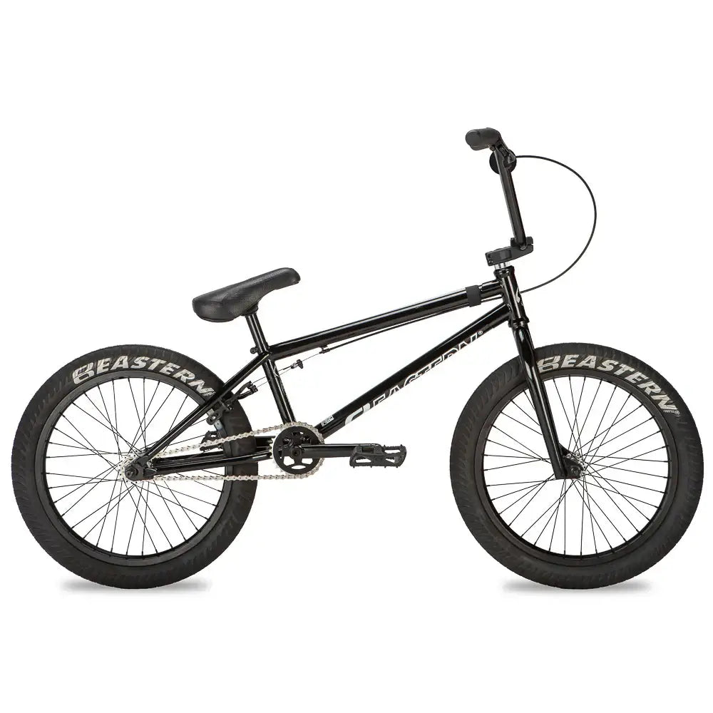 Eastern Thunderbird V2 BMX bike with chromoly frame, black finish, and Curb Monkey tires, ideal for dirt jumps.