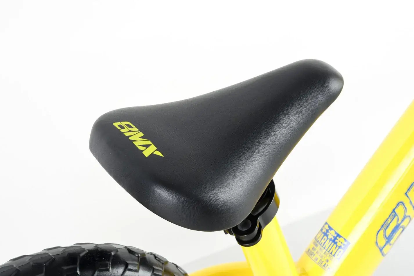 Close-up of the Eastern Pusher Balance Bike seat, lightweight and adjustable for growing riders.