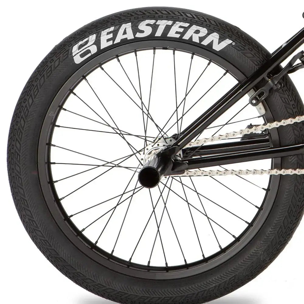 Eastern Shovelhead BMX bike rear wheel with black tire and spokes, showcasing light-weight design and quality materials.
