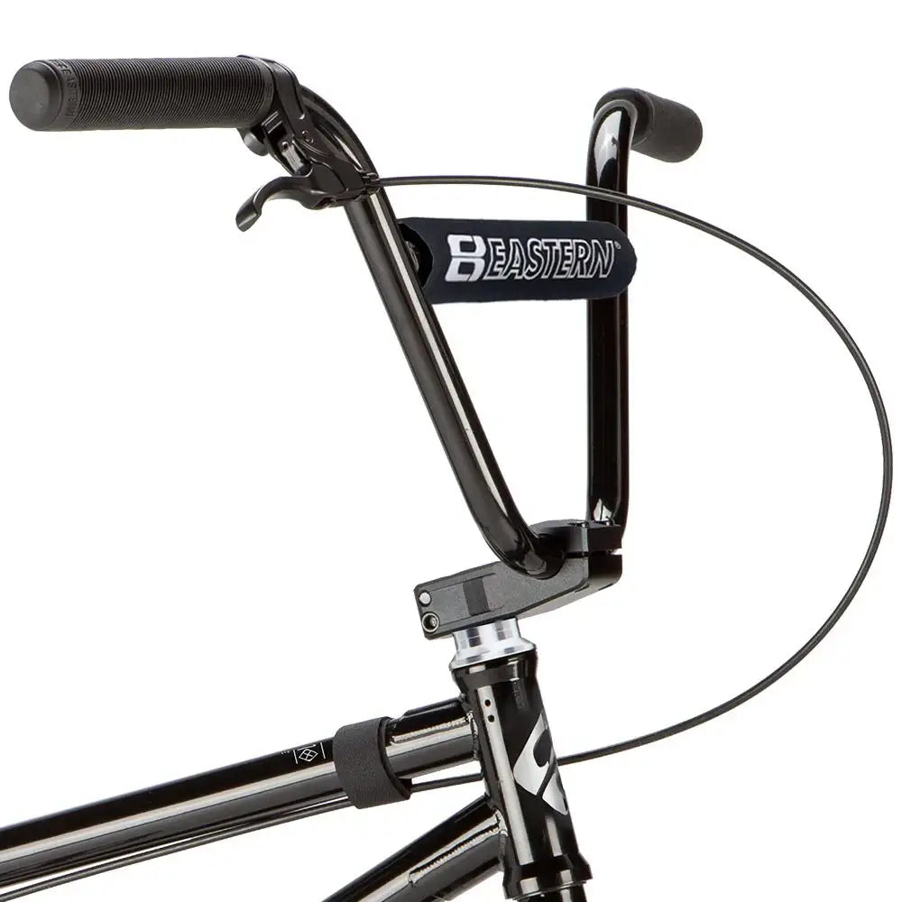 Eastern Bike Thunderbird V2 handlebars featuring durable grips and black BMX stem for optimal performance on trails.