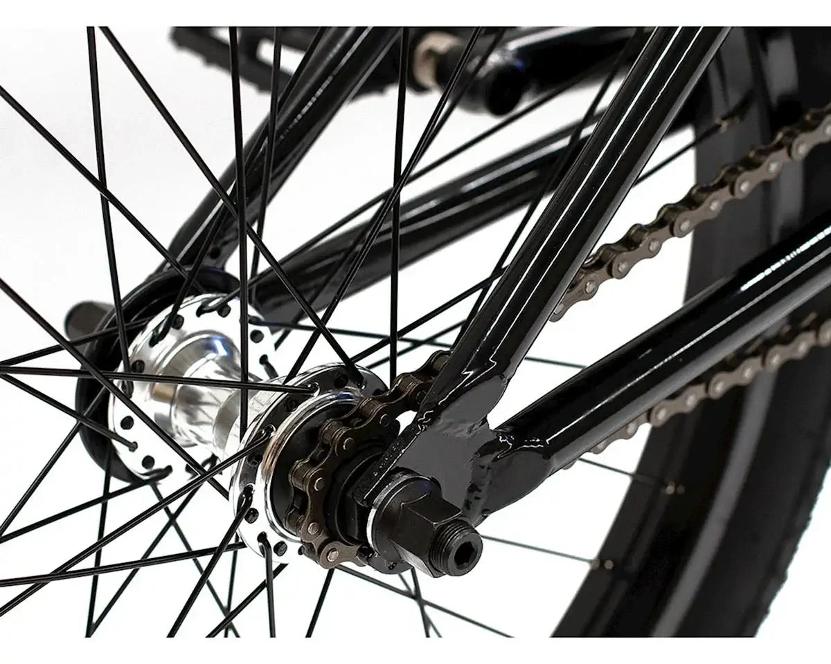 Close-up of the rear hub and chainstays of the Colony Premise 20" BMX bike, showcasing high-quality components.
