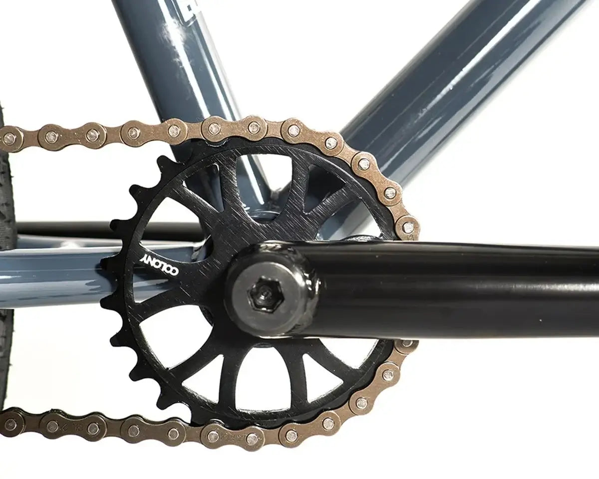 Close-up of the Colony Eclipse BMX bike's chainring and crankset, featuring a durable chromoly design.