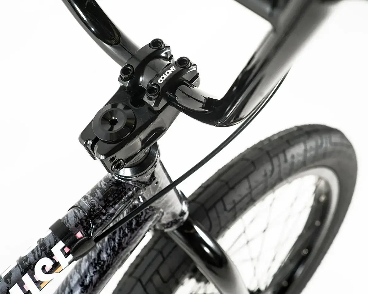 Close-up of Colony Premise BMX bike's handlebars and stem highlighting design and construction quality.