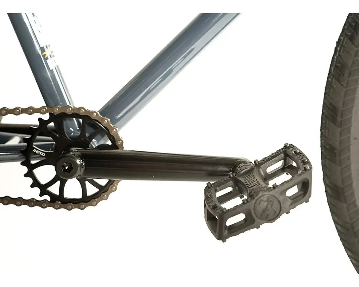 Close-up of Colony Eclipse 26" BMX bike pedal and crankset showcasing durable construction and design.