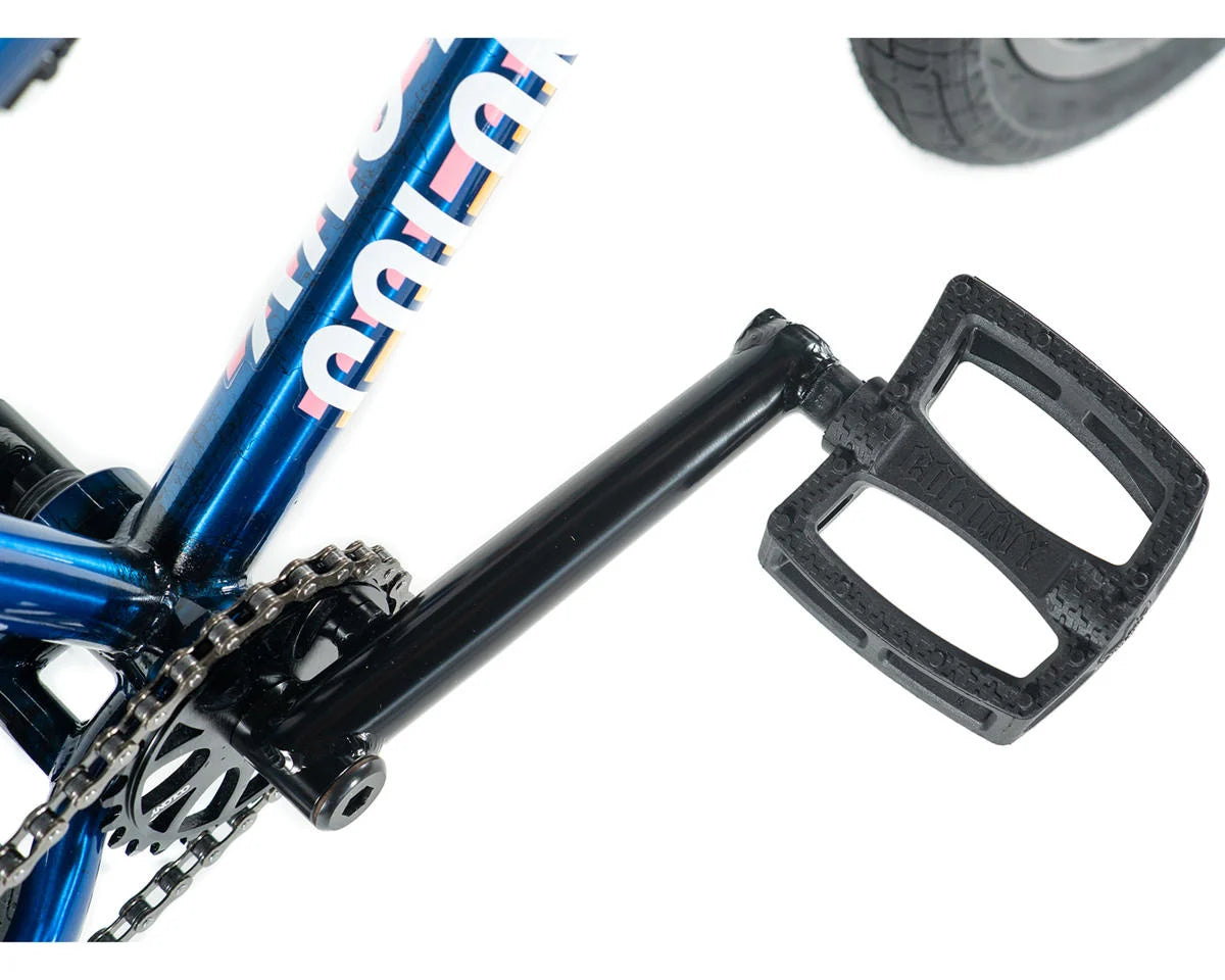 Close-up view of Colony Premise BMX bike crank and pedal showcasing full chromoly frame design.