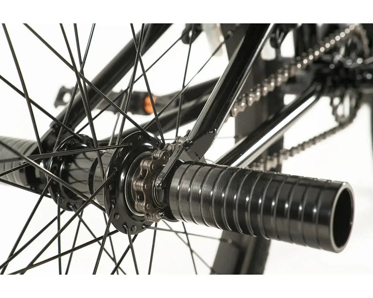 Close-up of the rear hub and grips of the Colony Apprentice 20" BMX Flatland bike showcasing quality components.