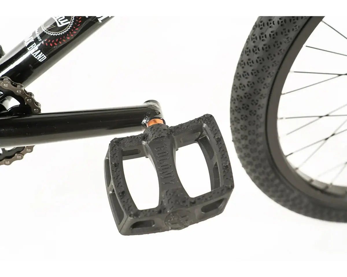 Close-up of the Colony Apprentice BMX bike pedal, showcasing its textured design for improved grip and control.