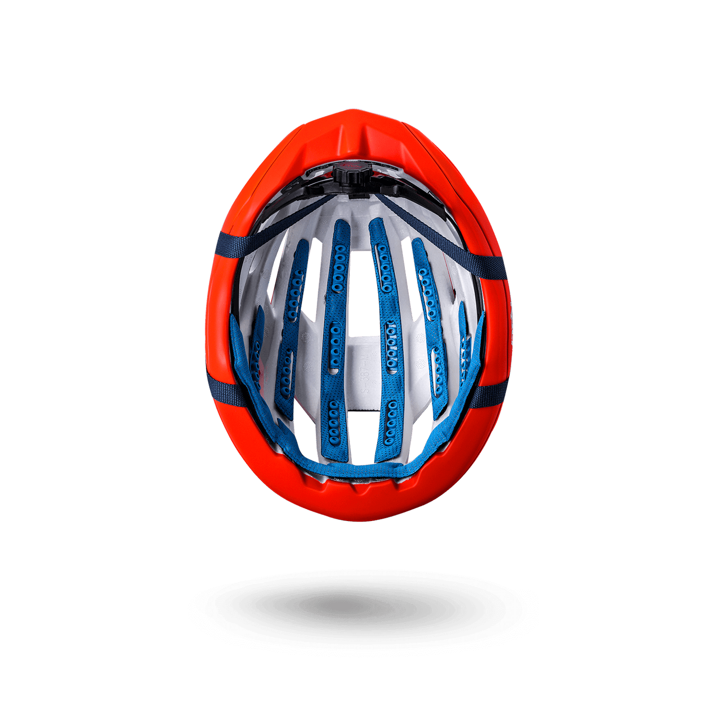 Interior view of the Grit Carbon helmet showcasing its vibrant orange design and safety features for road protection.