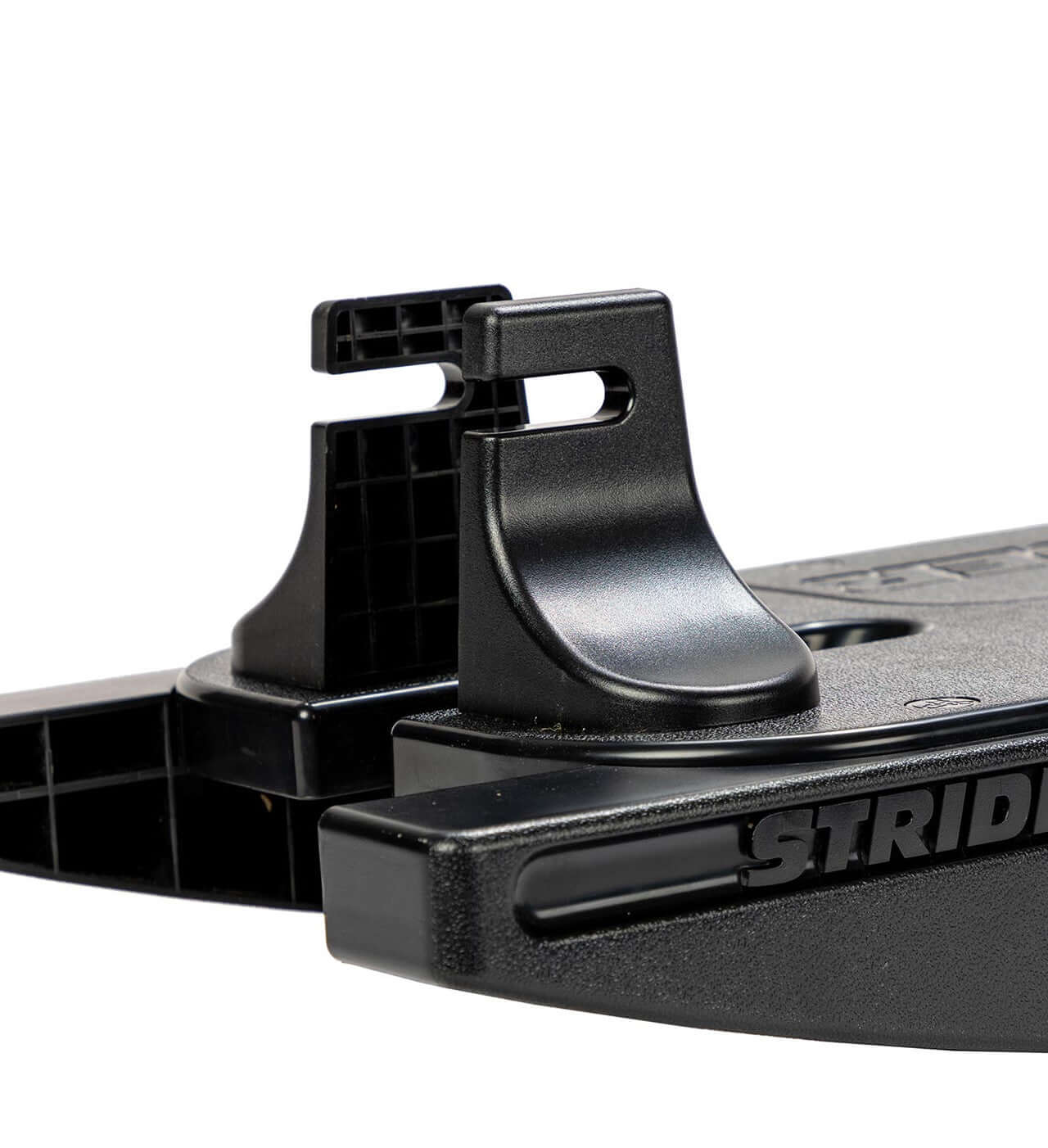 Close-up of the Strider Rocking Base attachment for Strider Balance Bikes, designed for young children.