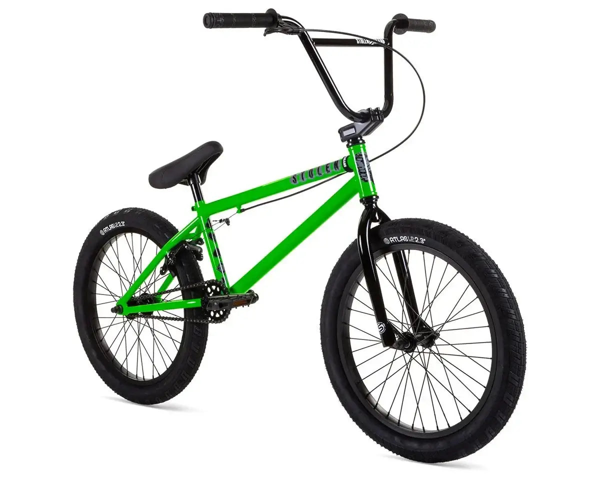Stolen Casino XL 20" BMX Bike in green with black tires, ideal for learning tricks and suitable for taller riders.