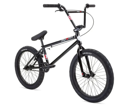 Stolen Overlord 20" BMX bike with high-tensile steel frame and Fiction Atlas Tires, ideal for performance and durability.