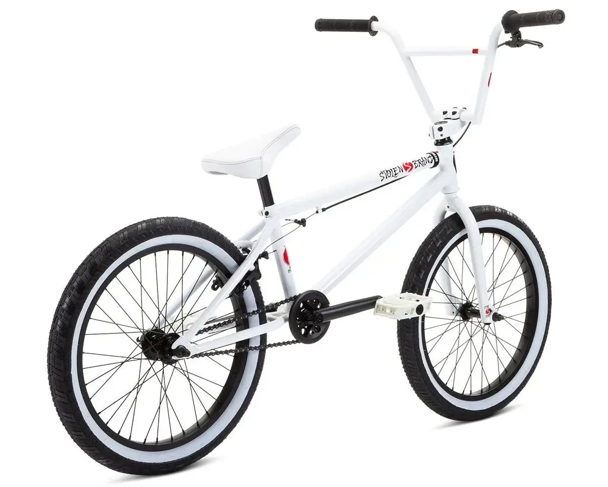 Stolen Overlord 20" BMX bike with high-tensile steel frame and Fiction Atlas Tires, perfect for durability and performance.