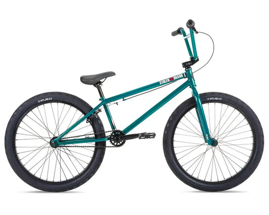 Stolen Saint 24" BMX bike in teal color with 24" wheels and a strong chromoly frame, ideal for cruising and BMX riding.