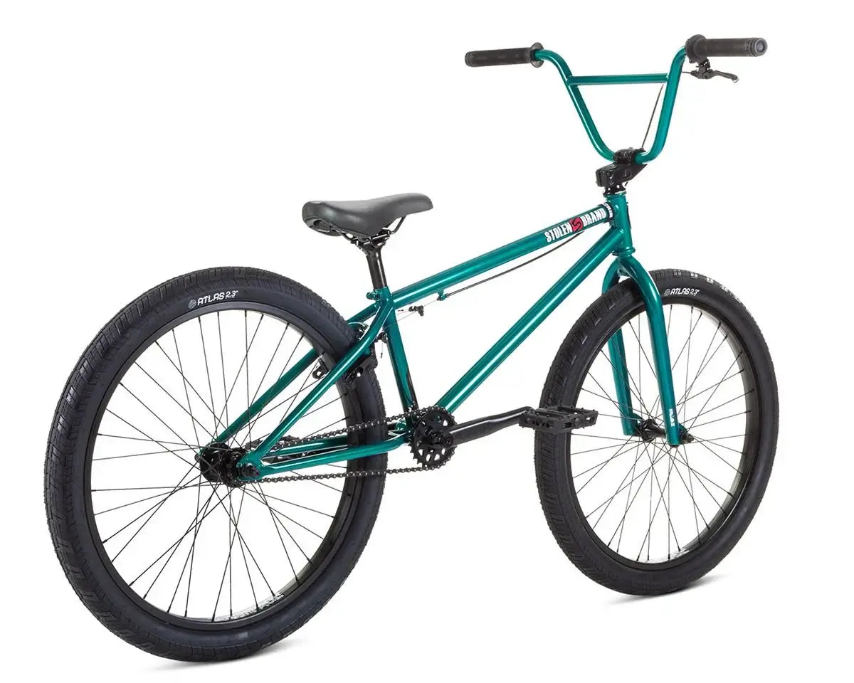 Stolen Saint 24" BMX bike in teal, featuring a chromoly frame, 24" wheels, and BMX-style handlebars.