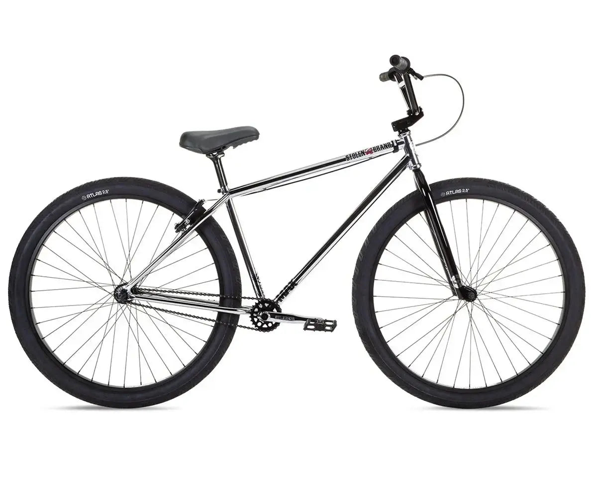 Stolen Max 29" bike featuring a sleek chrome frame and large black tires, ideal for smooth rides and commuting.