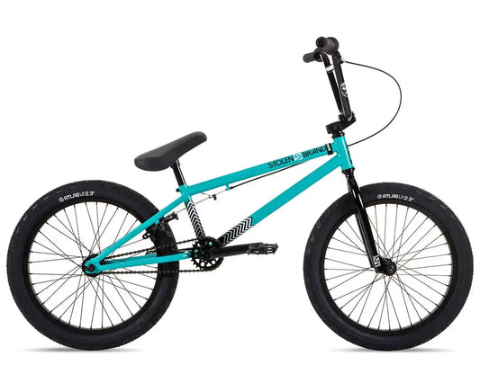 Stolen Compact 20" BMX Bike in turquoise with black wheels and graphics, designed for shorter riders.
