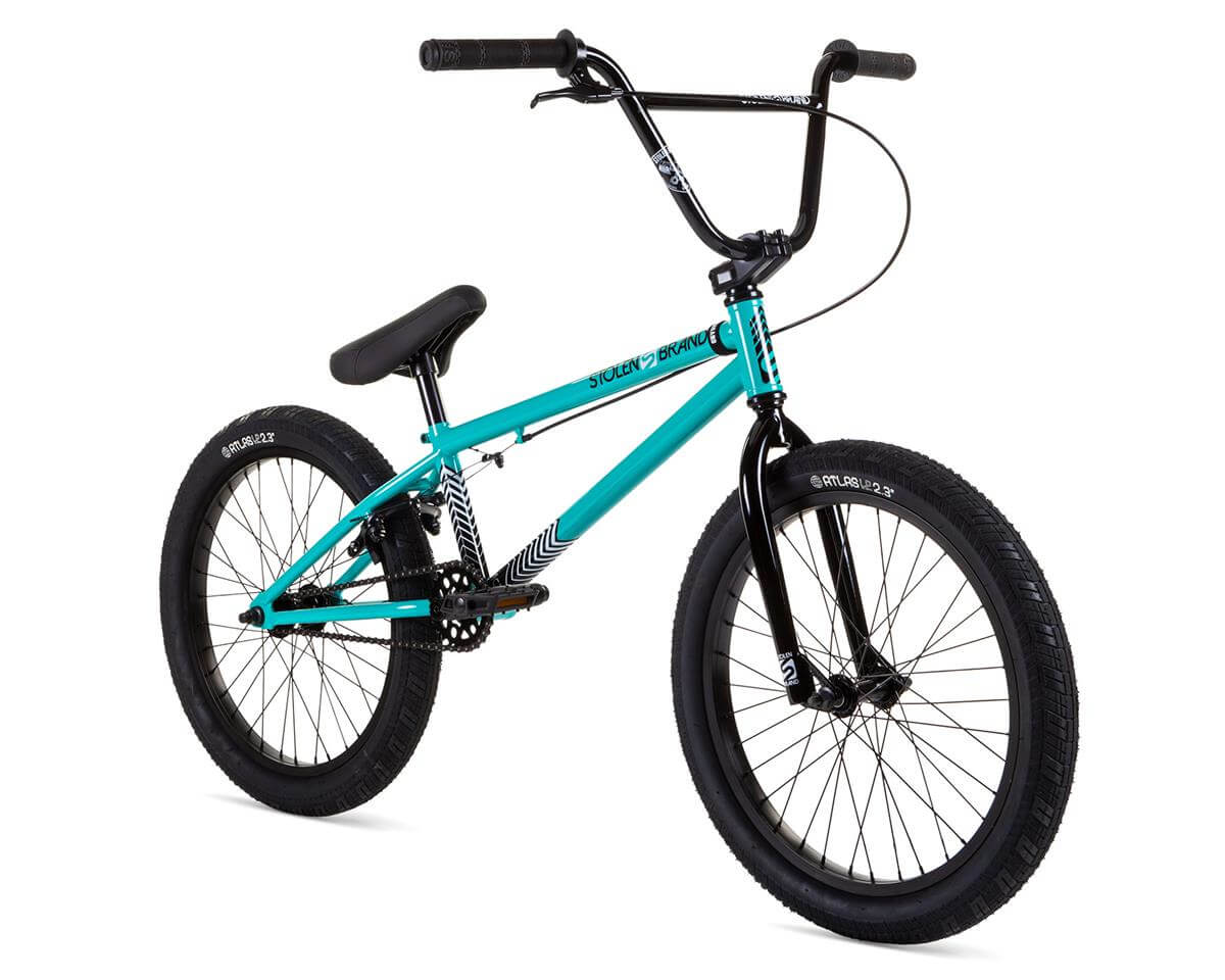 Stolen Compact 20" BMX bike in teal with black handlebars and wheels, designed for shorter riders seeking full-size experience.