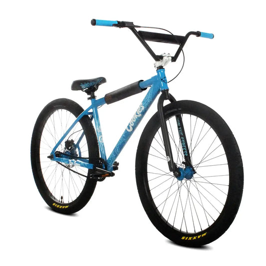 Throne The Goon 29" BMX bike in blue with robust tires and handlebars, designed for grinding and stunts.