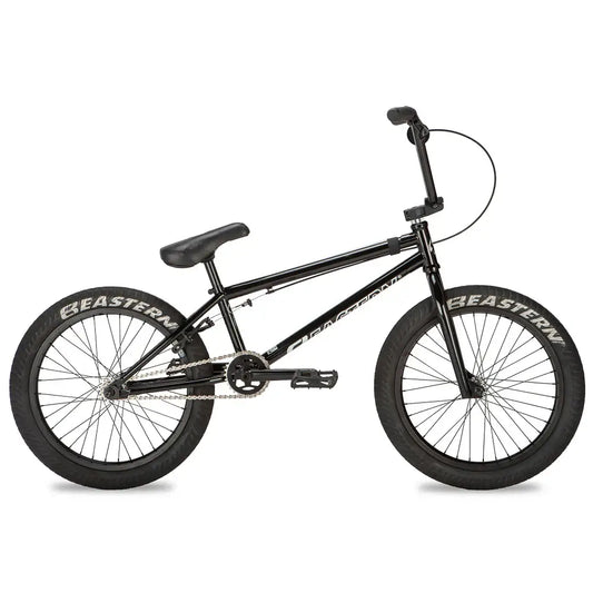 Eastern Thunderbird V2 BMX bike with chromoly frame, black finish, and Curb Monkey tires, ideal for dirt jumps.