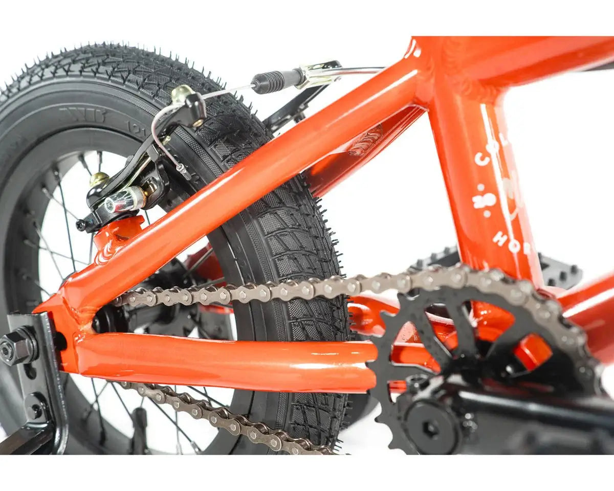 Close-up of Colony Horizon 12" BMX bike frame, showcasing the lightweight alloy construction and rear wheel.