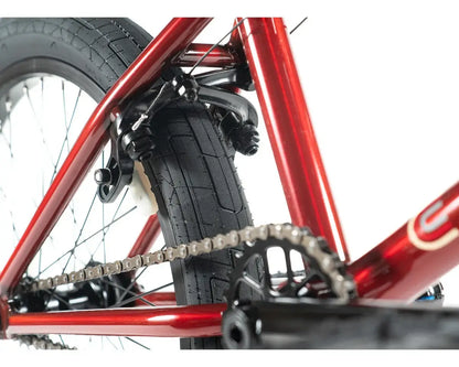 Close-up view of the Colony Emerge BMX bike's Chromoly frame, rear tire, and chain components.