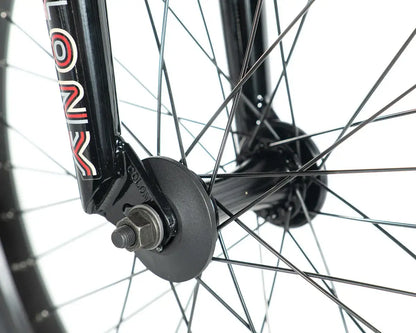 Close-up of Colony Emerge BMX bike fork and wheel hub, showcasing durable spokes and design details.