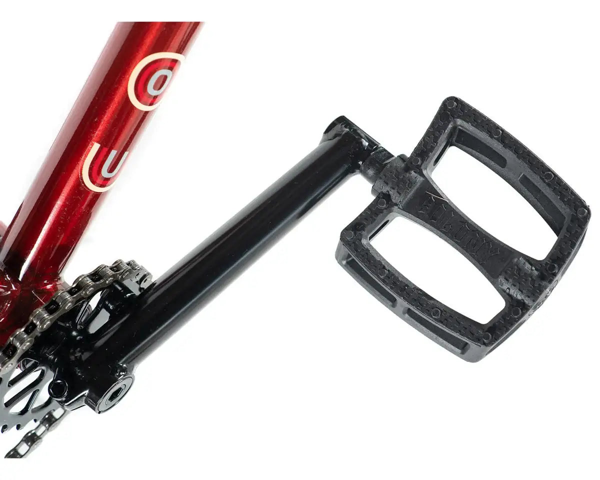 Close-up of Colony Emerge BMX bike pedal, showcasing durable design and Chromoly frame details.