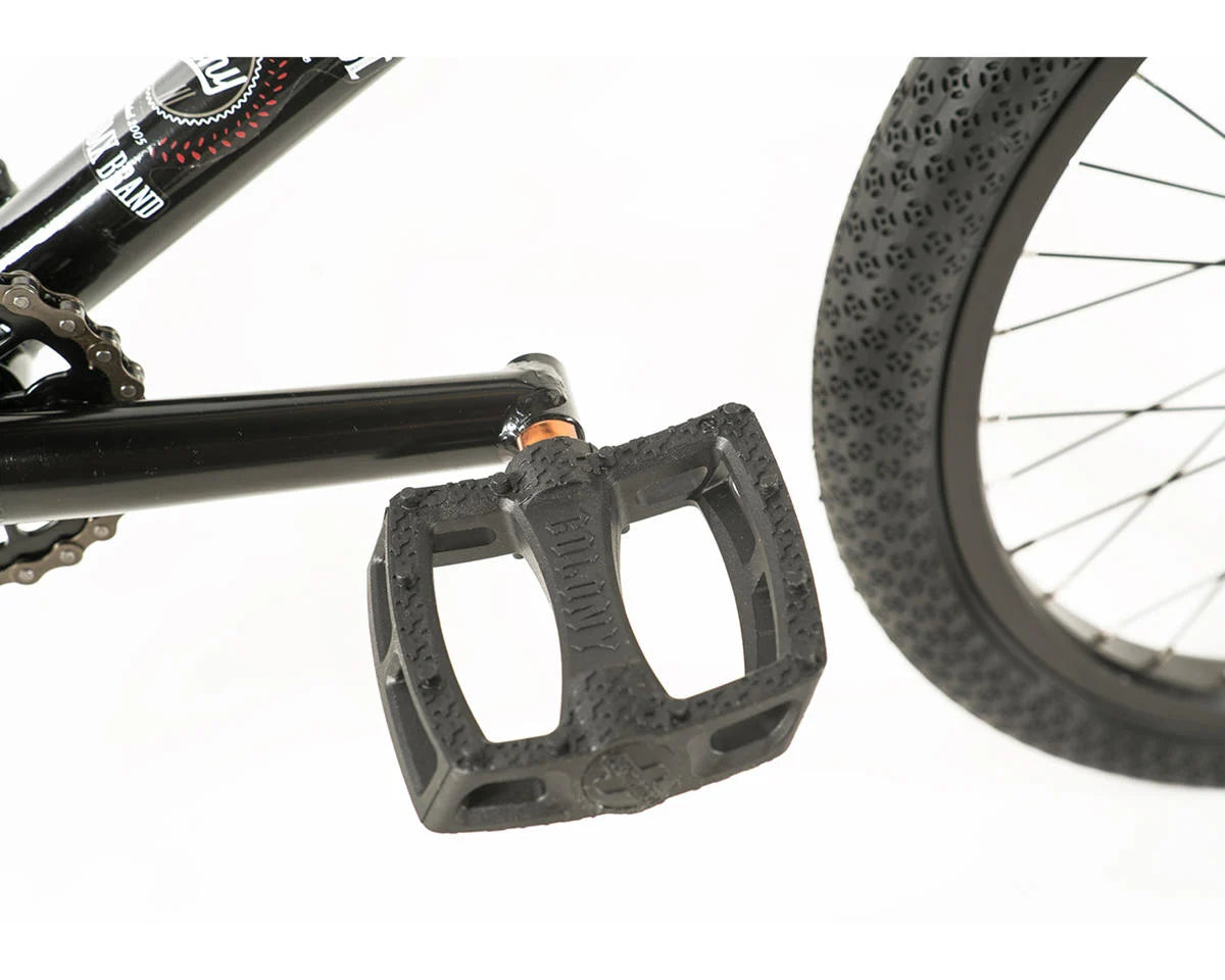 Close-up of the Colony Apprentice BMX bike pedal, showcasing its textured design for improved grip and control.