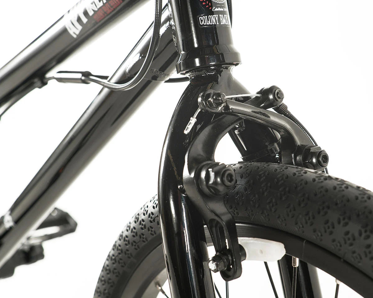 Close-up of the Colony Apprentice BMX bike's fork and front wheel, showcasing its sleek design and full chromoly frame.