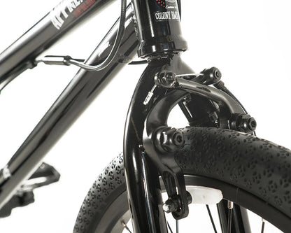 Close-up of the Colony Apprentice BMX bike's fork and front wheel, showcasing its sleek design and full chromoly frame.