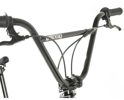 Close-up of Colony Apprentice BMX bike handlebars showcasing sleek design and cable features.