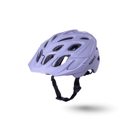 Chakra Solo bike helmet in soft lavender with ventilation holes and adjustable straps for comfort and safety.