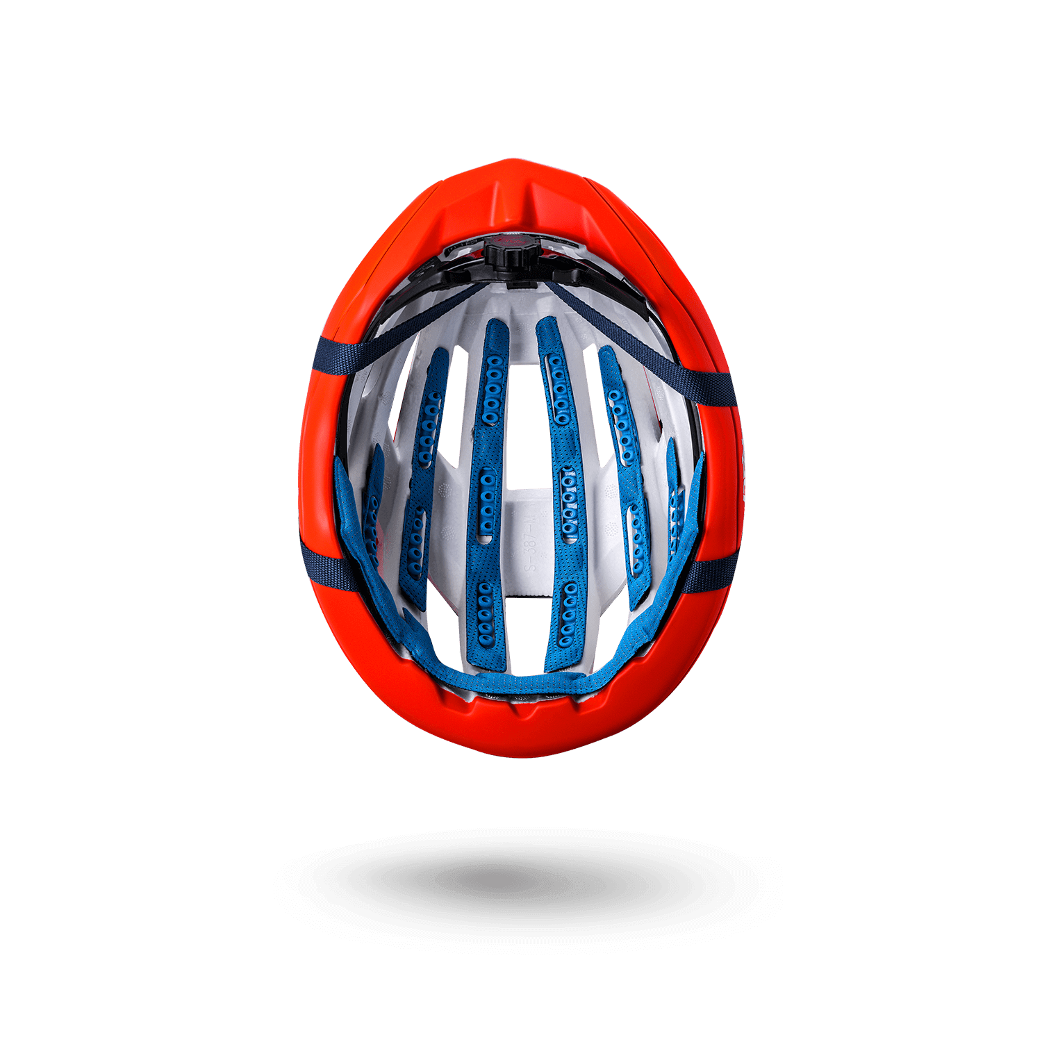 Interior view of the Grit Carbon helmet showcasing its vibrant orange design and safety features for road protection.