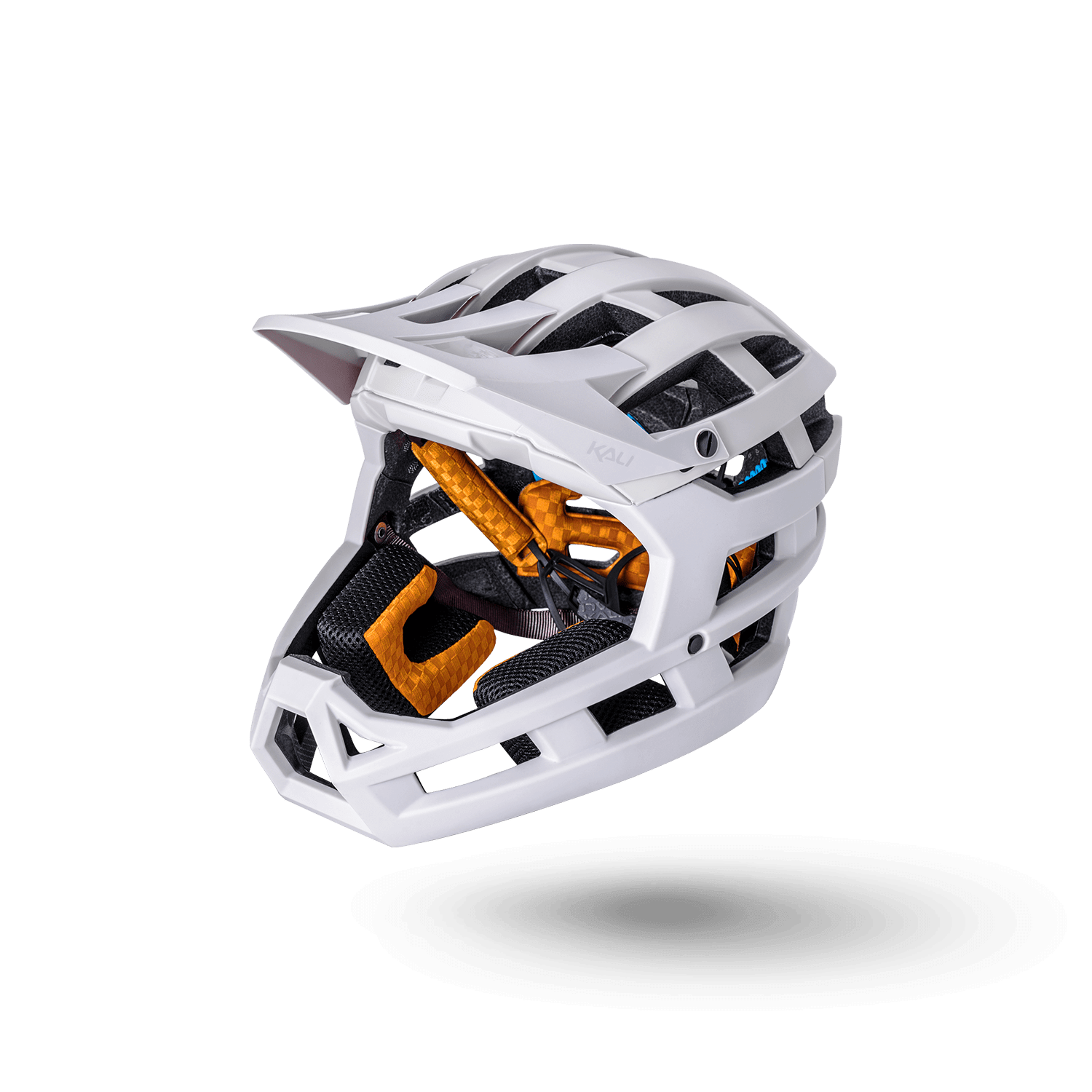 Invader 2.0 trail helmet in white with orange padding, designed for ultimate protection and comfort on off-road rides.
