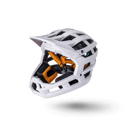 Invader 2.0 trail helmet in white with orange padding, designed for ultimate protection and comfort on off-road rides.