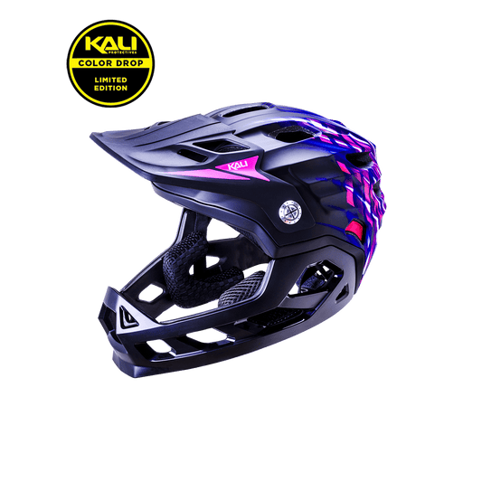 Limited edition Kali full-face child helmet featuring a stylish black and purple design, perfect for young riders.